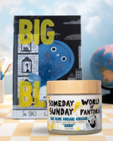The Big Blue book beside the Someday Sunday x World of Fantoria Seen body cream jar.